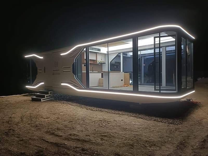 Rounded capsule concept illuminated at night