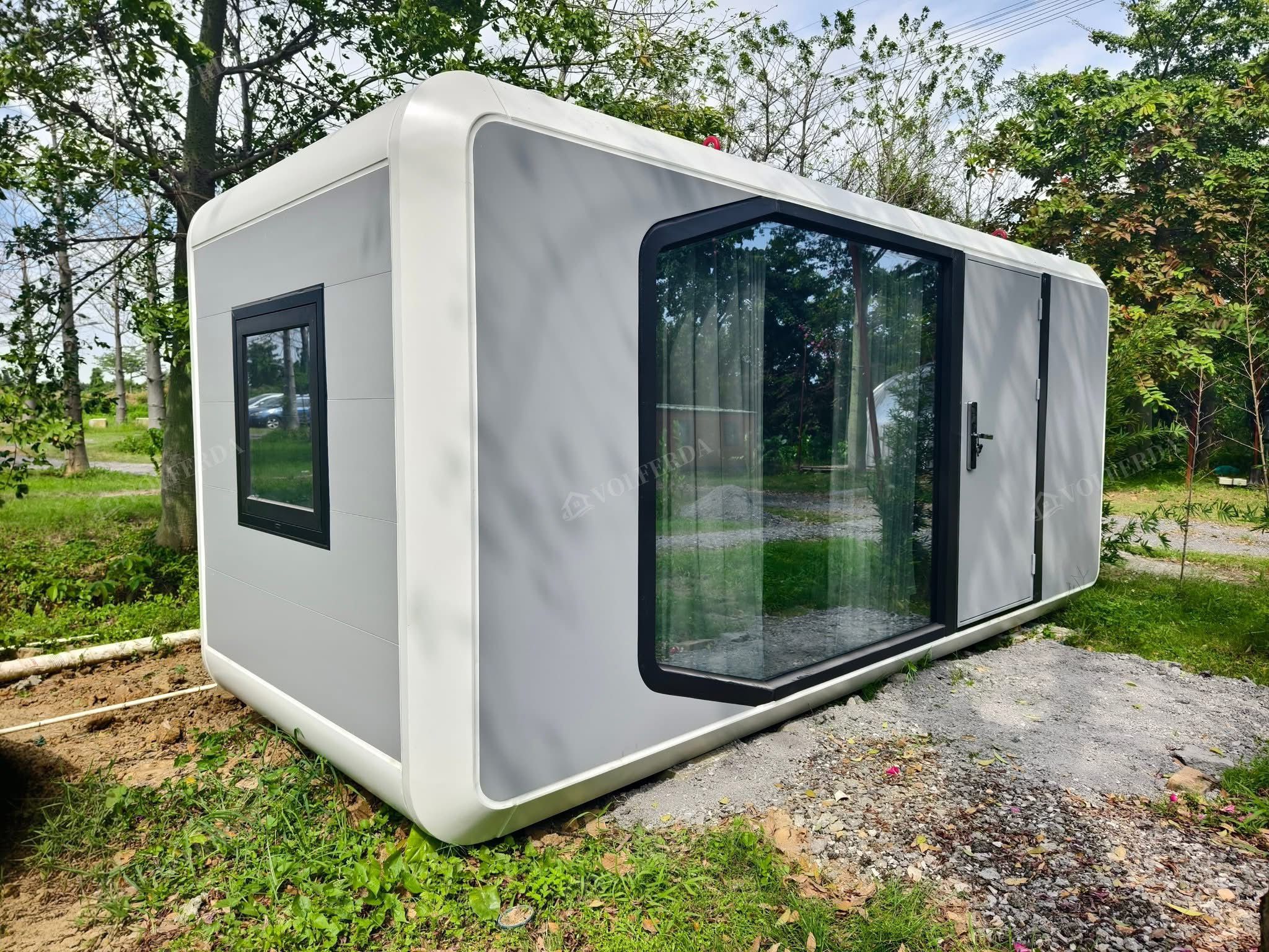 Rounded capsule concept placed near trees